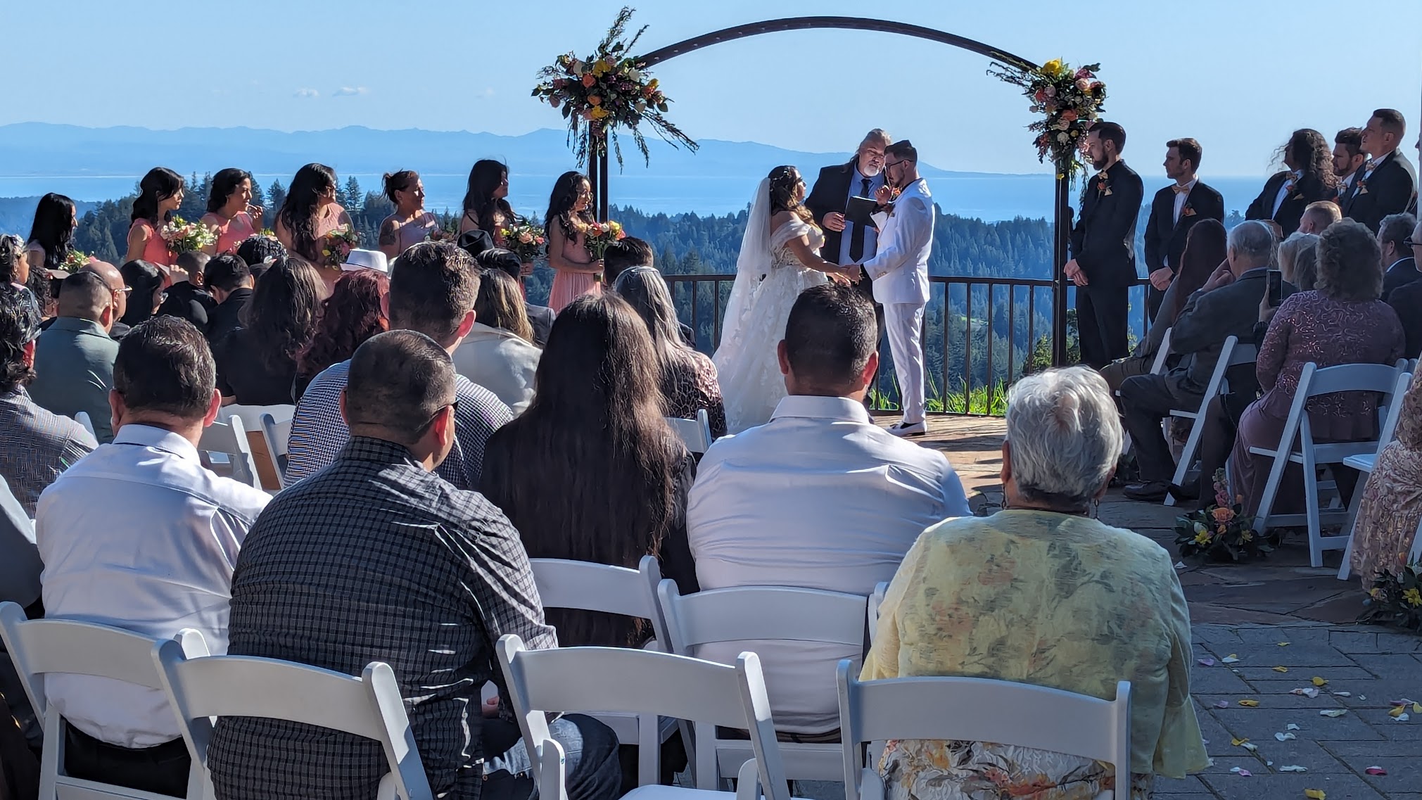 Wedding ceremony with mountain and bay views at Living Well