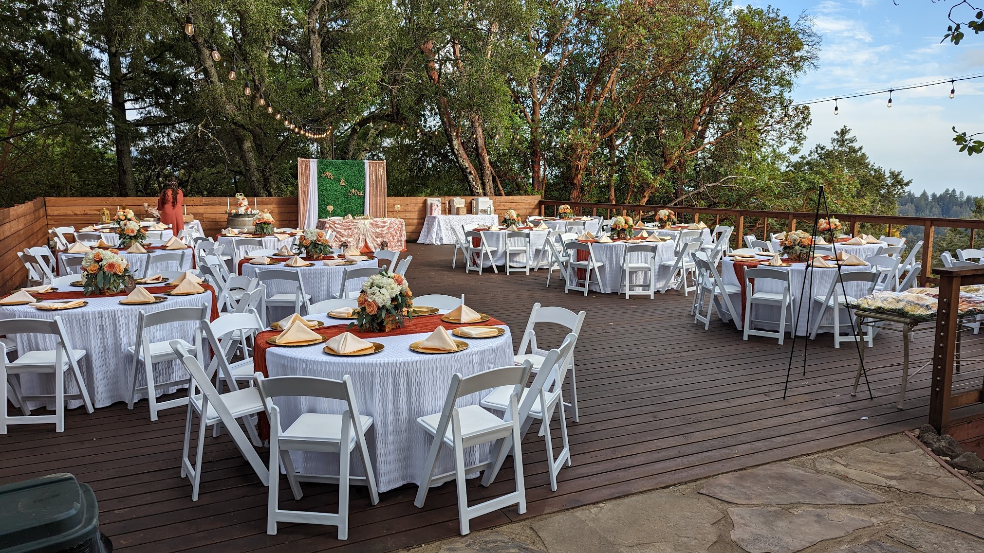 Reception deck set for dinner at Living Well Event Center