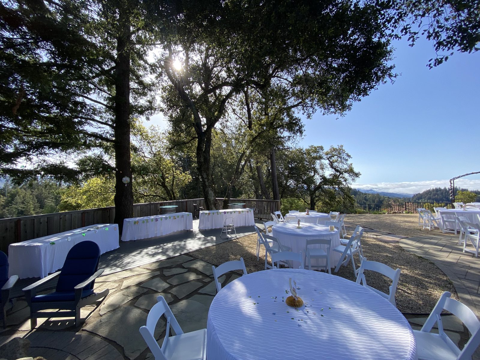 Outdoor reception tables set on the grounds at Living Well Event Center